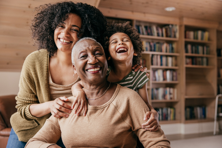 Family members taking care of grandmother