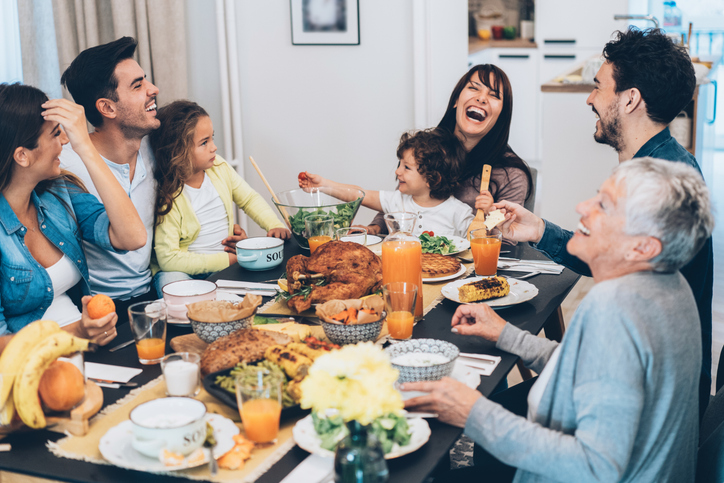 Beautiful big Family enjoys thanksgiving lunch together