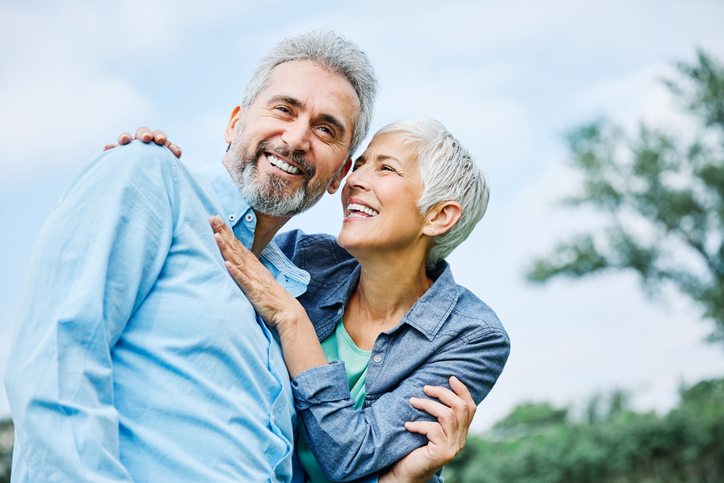 portrait of happy smiling senior couple outdoors